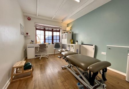 clinc room with a patient bed