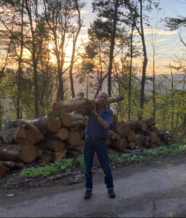 Man working planting trees at Stand Wood above Chatsworth