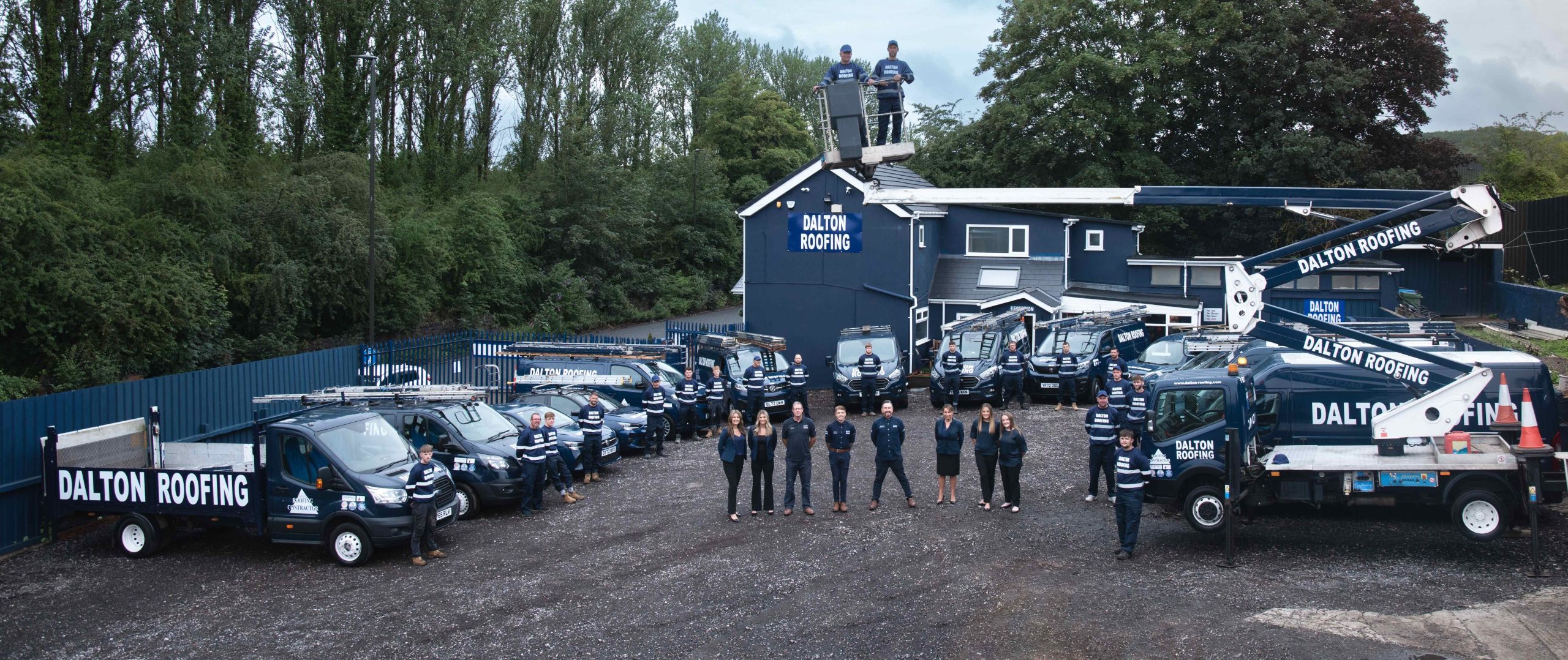 Dalton Roofing full team standing outside premises