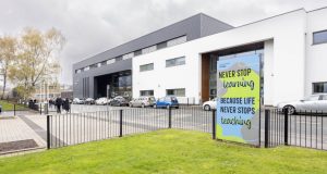 Front of main Chesterfield College reception building, right side white, left side grey
