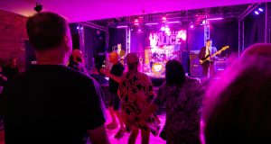 Crowd dancing to band at Real Time Live
