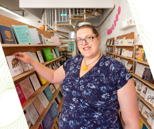 Shop Indie, shop owner Lisa stocking up cards